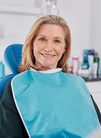 Woman smiling in the dental chair