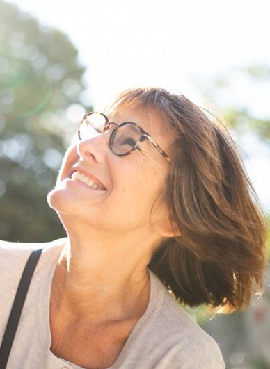 Lady smiles at the sun