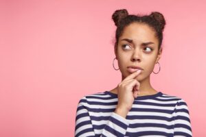 Woman wondering how much enamel is removed for veneers